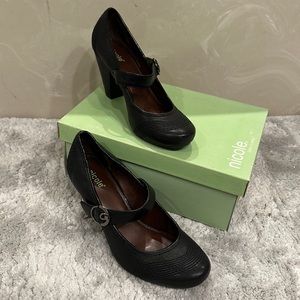 Black buckle dress shoes